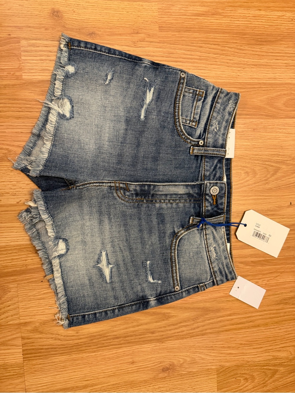 eunina Light Blue Distressed Frayed-Hem Denim Shorts